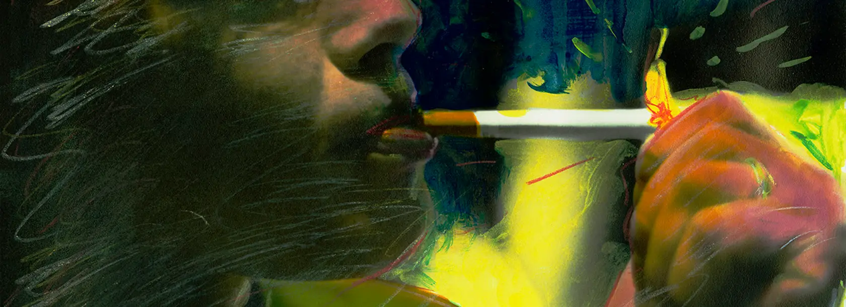 Fotografia a colori vividi di una persona che accende una sigaretta, scattata da Roberto Orlandi.
